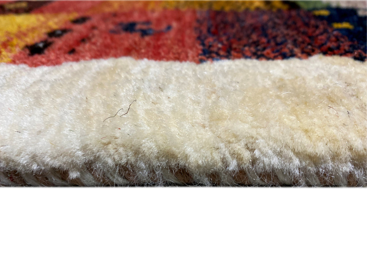 Gabbeh Luri-Teppich 145x105 cm Nahaufnahme der hellen Florkante mit Fransen