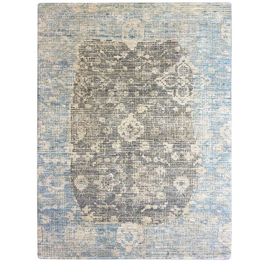 Rectangular, flat-woven rug with bleached blue-gray patterns
