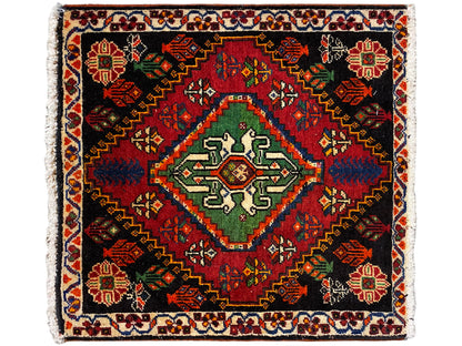 Square Poshti rug with a black background, red/green/blue medallion and border