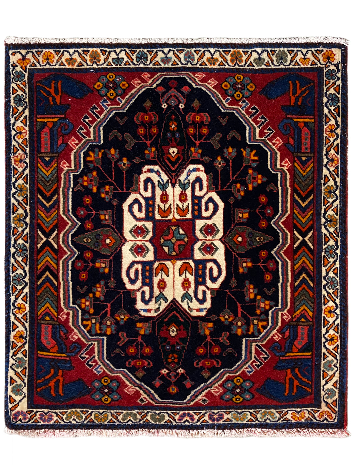 Poshti rug in a square design with a blue background and a white-and-red ornamental pattern