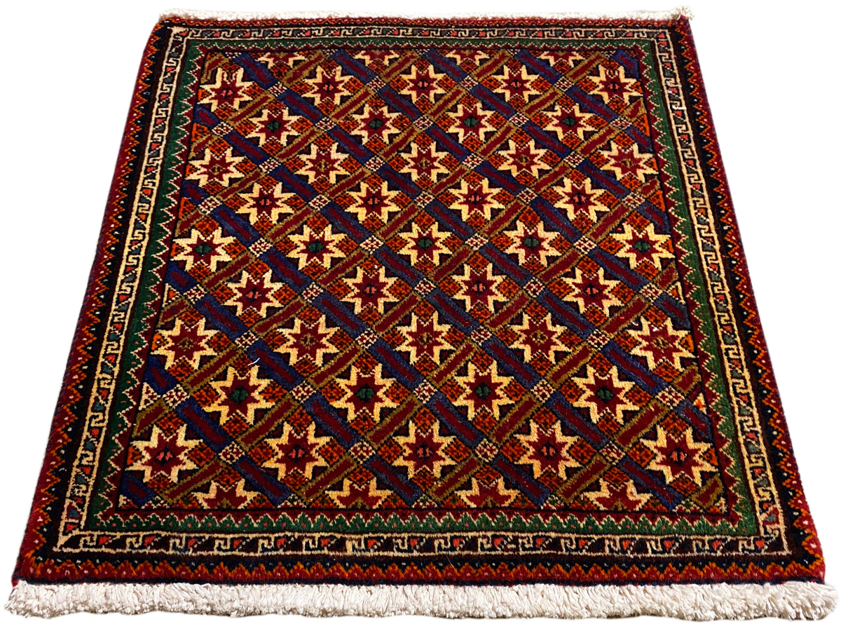 Poshti rug 62x52 cm, diagonal view: red, blue, and green patterns with fringes.