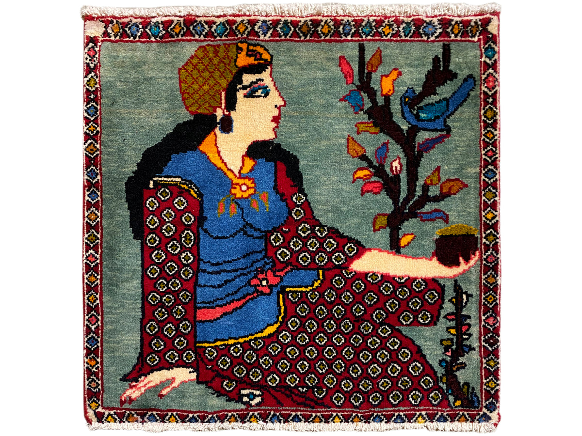 Poshti rug 68x63 cm with reclining figure and tree in the background, border, fringes