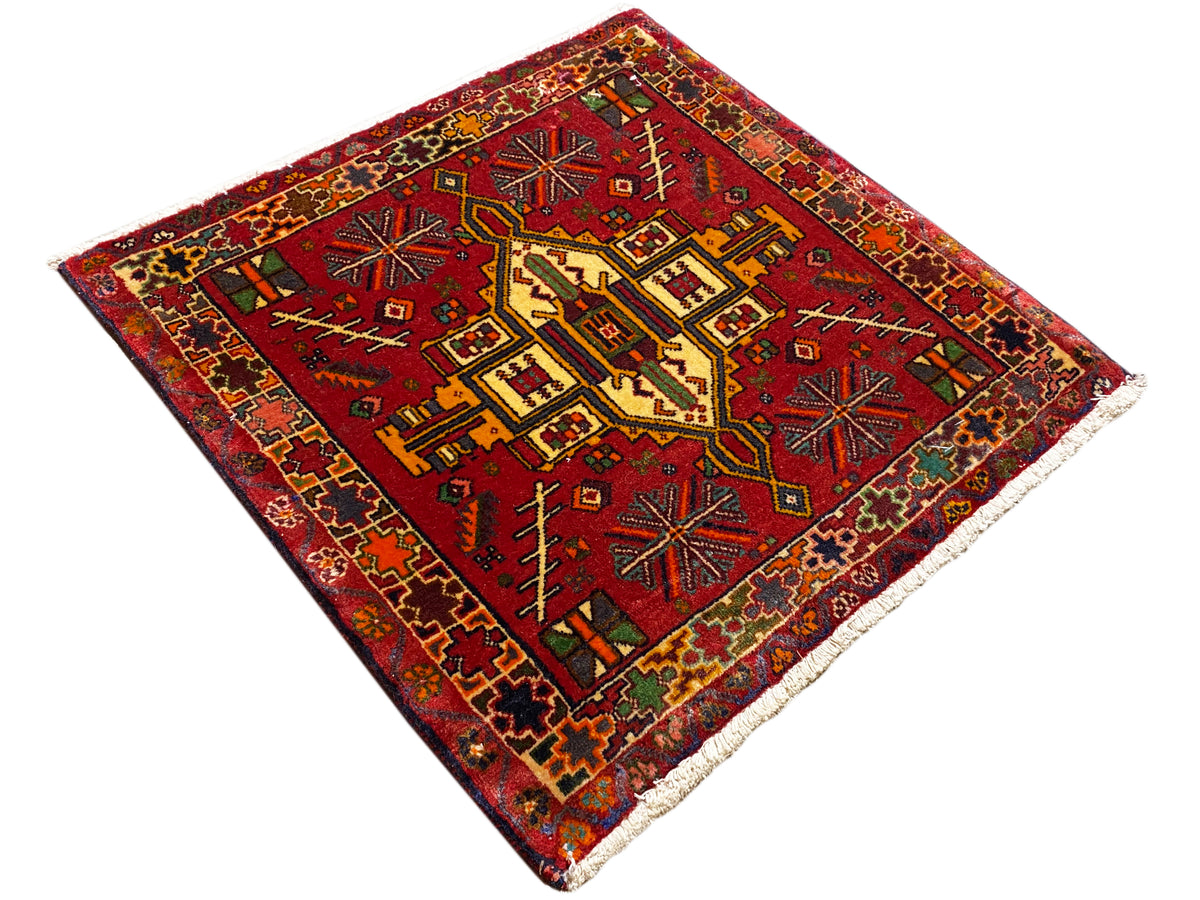 Poshti rectangular rug, red ornamental design with yellow, blue and green details