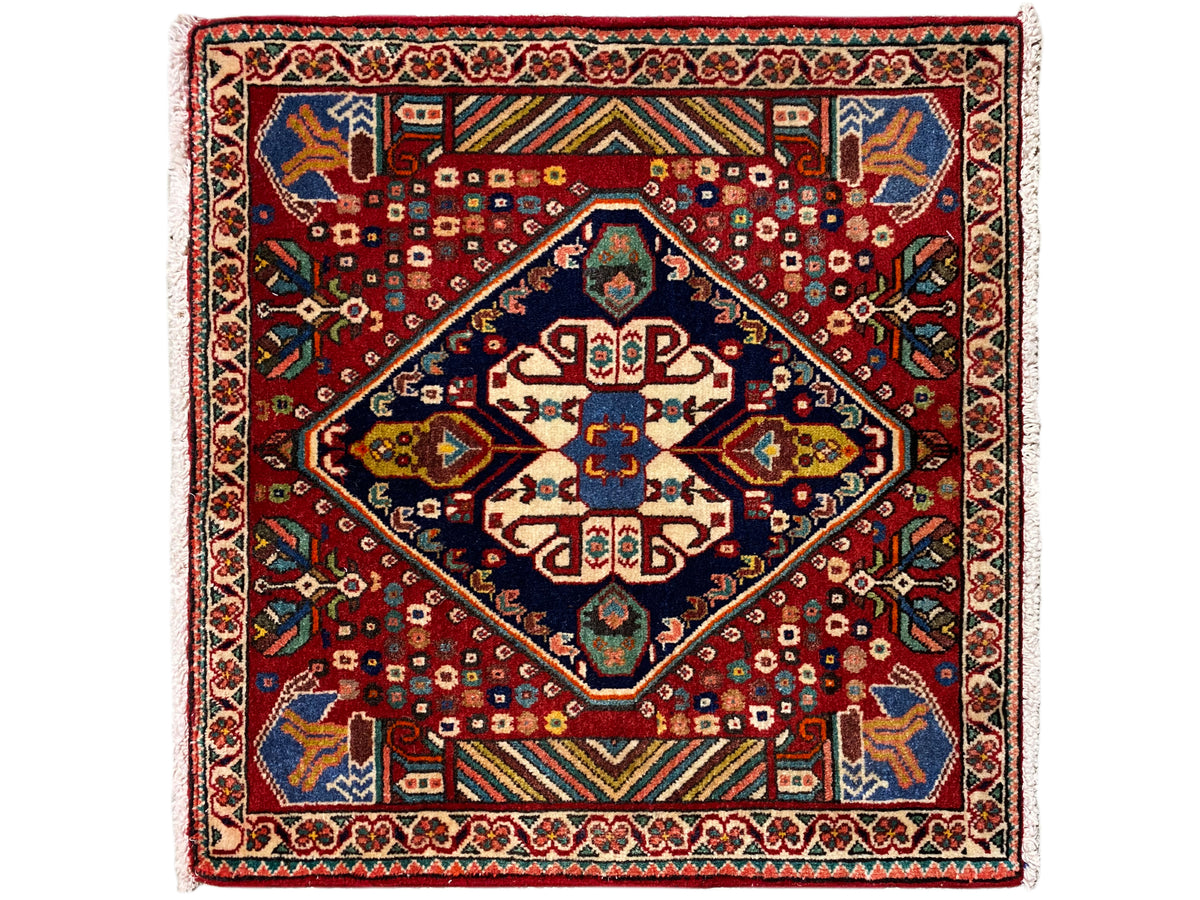 Rug 66x62 cm in Poshti design: red ground with a blue central medallion