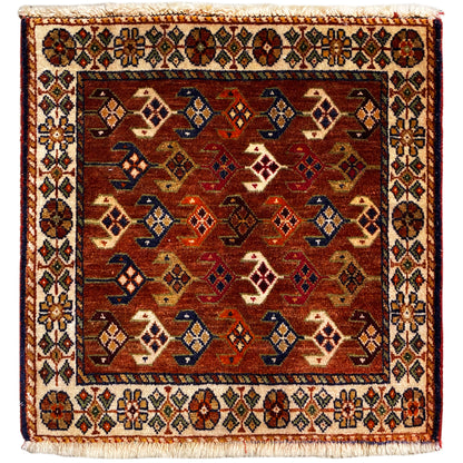 Poshti rug 60x55 cm with a geometric pattern in red, brown, blue, and cream