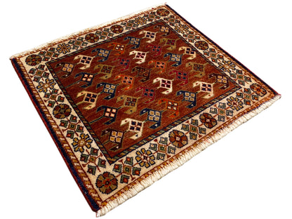 Poshti rug 60x55 cm with a bound edge, fringes, and a reddish-brown pattern