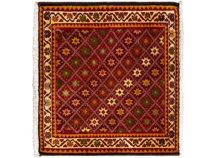 Poshti rug, rectangular, colorful decoration with star and diamond patterns in the central field.