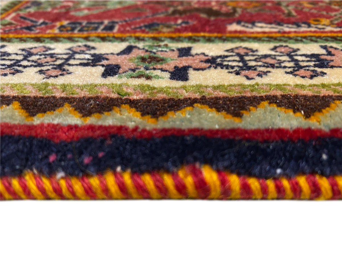 Poshti rug 63x61 cm close-up: multicolored woven edge with fringes and pronounced texture.