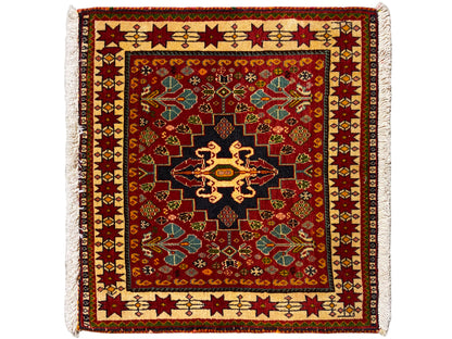 Rug 60x58 cm: red ornament, black center, colored border, fringes