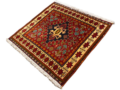 Rug 60x58 cm, diagonal view: red field with black center, fringe