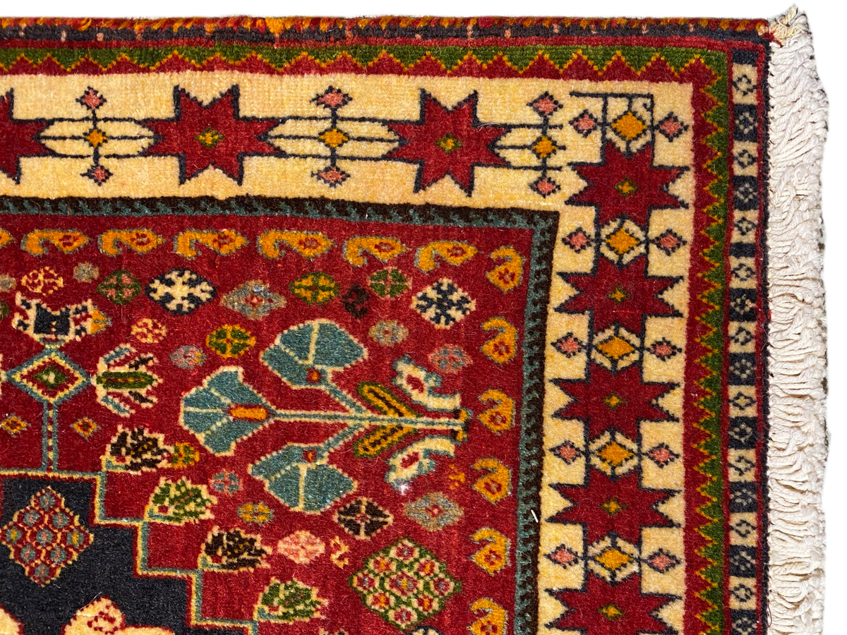 Carpet detail: multicolored border and ornamental motifs, side fringe edge