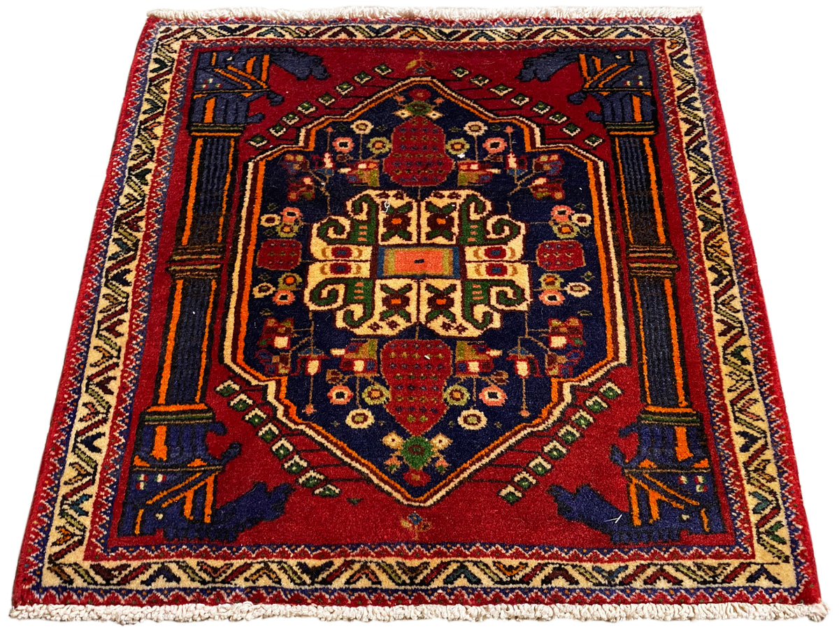 Poshti rug 66x62 cm laid flat: red central medallion with geometric ornaments.