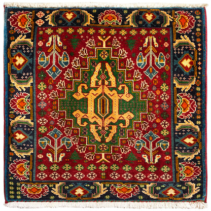 Rectangular rug (67x66 cm) with a red central medallion, multicolored ornaments, and border