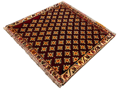 Poshti rug 61x59 cm: dark red rug with a diamond pattern, fringes on all sides