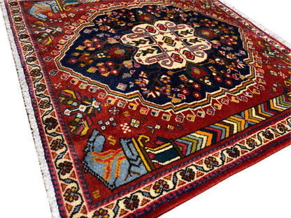 Poshti rug 65x61 cm detail view: red field, blue-black ornament, contrasting edges