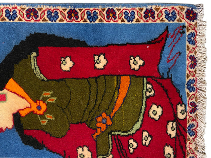 Poshti carpet 65x63 cm close-up: figure in a green robe, red field, and fringed border