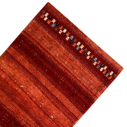 Handgemachter Teppich rot gestreift

