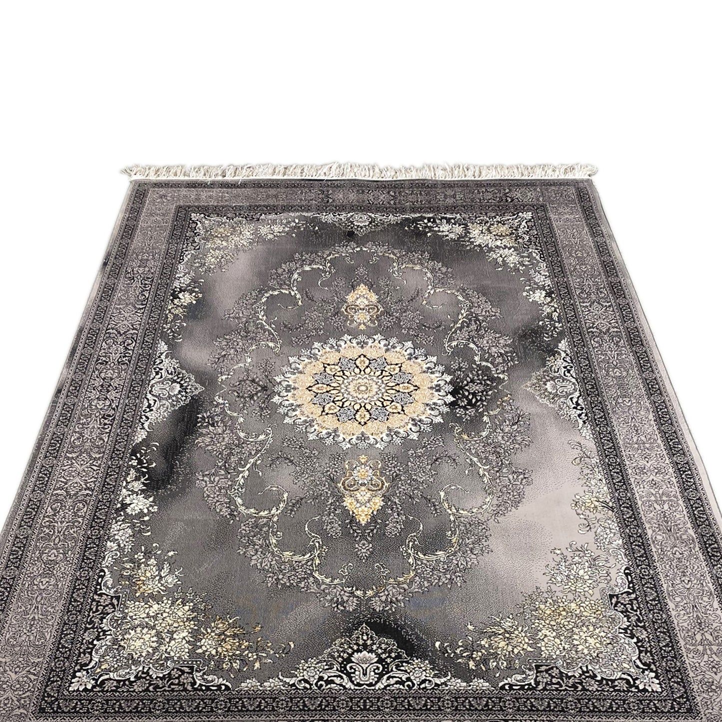 Ein grauer gewebter Teppich, der Behaglichkeit im Wohnzimmer schafft